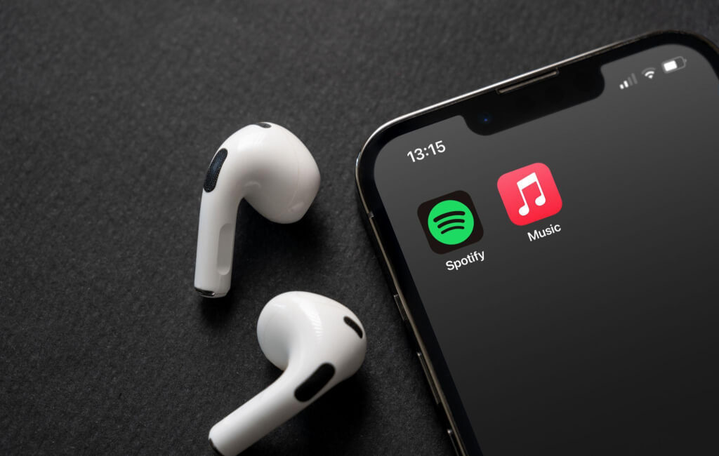 AirPods next to the Spotify app | Spotify’s North Star Metric