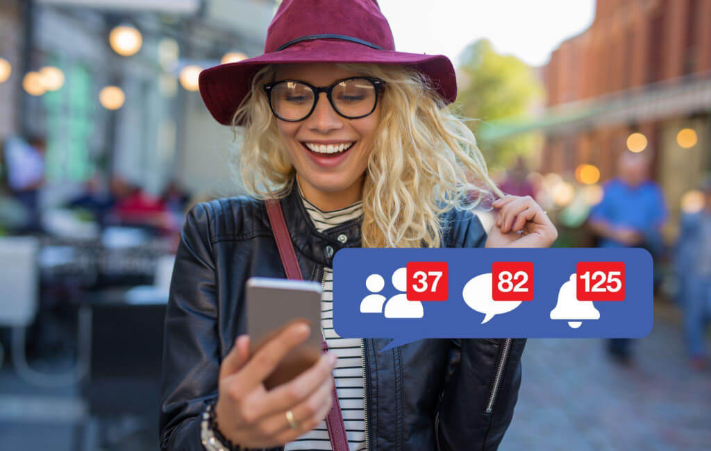 Woman with Facebook message notifications | Automate Facebook ads