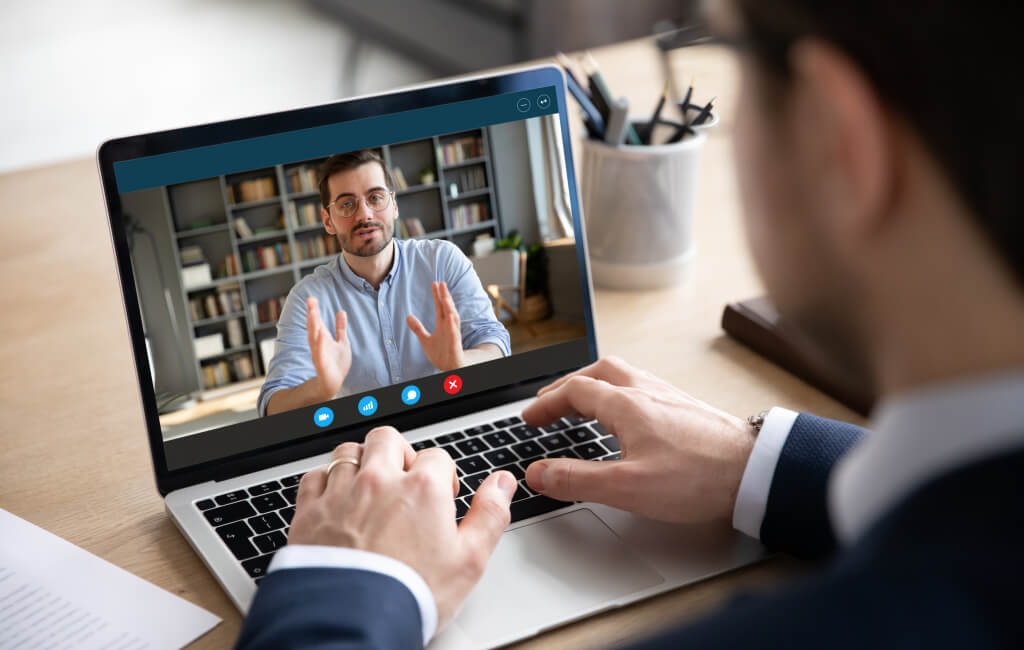 Man in online meeting | How to increase organic traffic