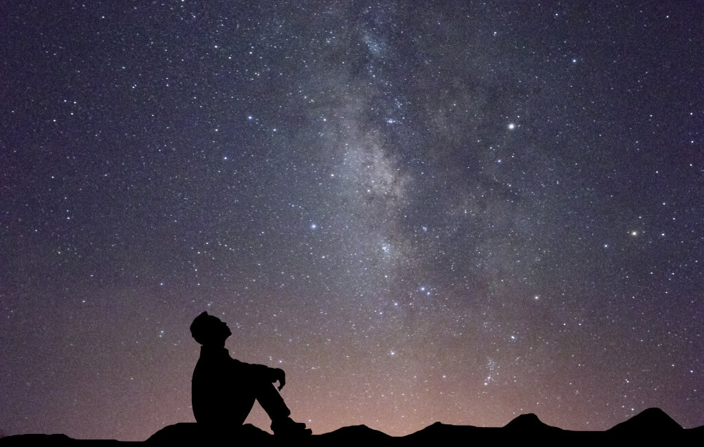 Person looking up at the stars | Amazon’s North Star Metric