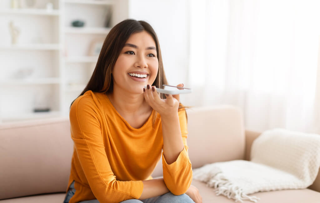 Woman using voice search | How to increase organic traffic