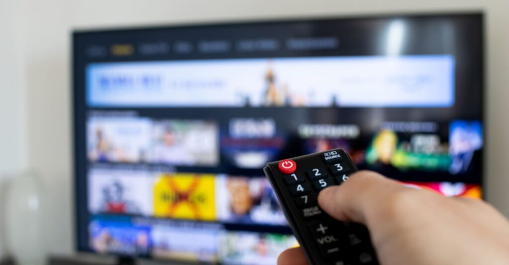 Person watching streaming on tablet |Netflix’s North Star metric